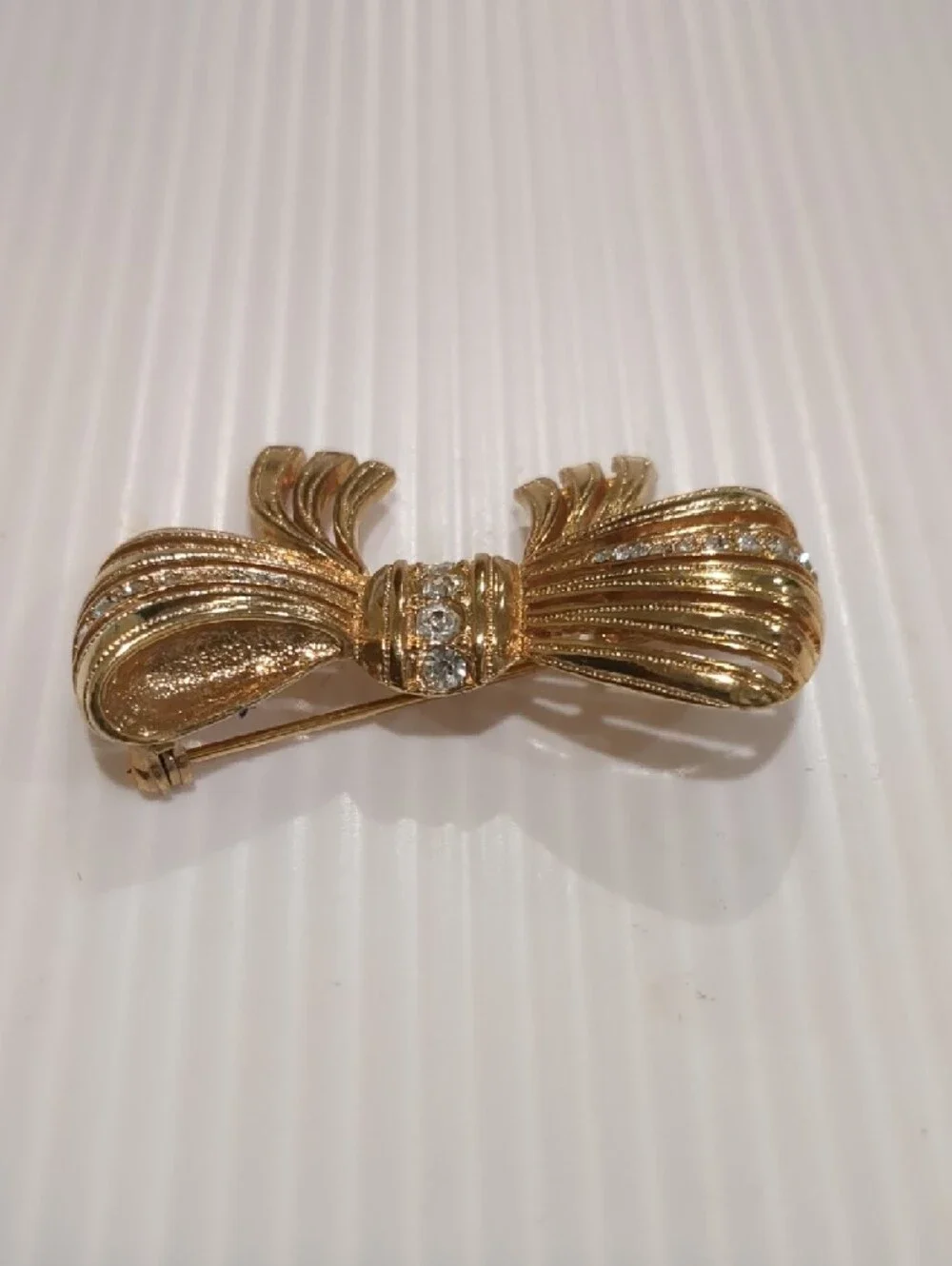 Vintage Czech gold-tone Bow Pin Brooch Clear Glass Rhinestones